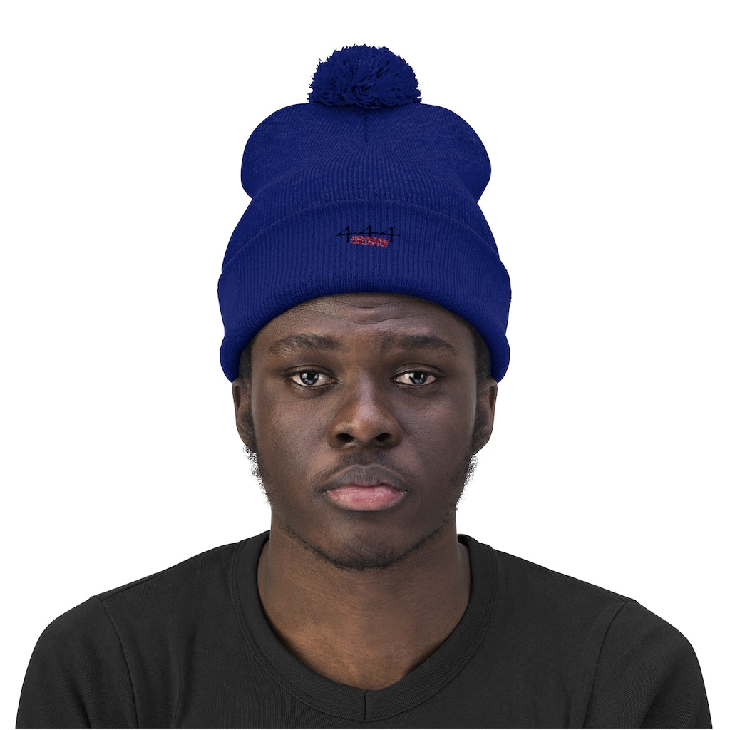 Protected Pom Pom Beanie