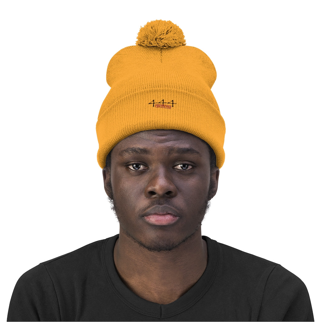 Protected Pom Pom Beanie